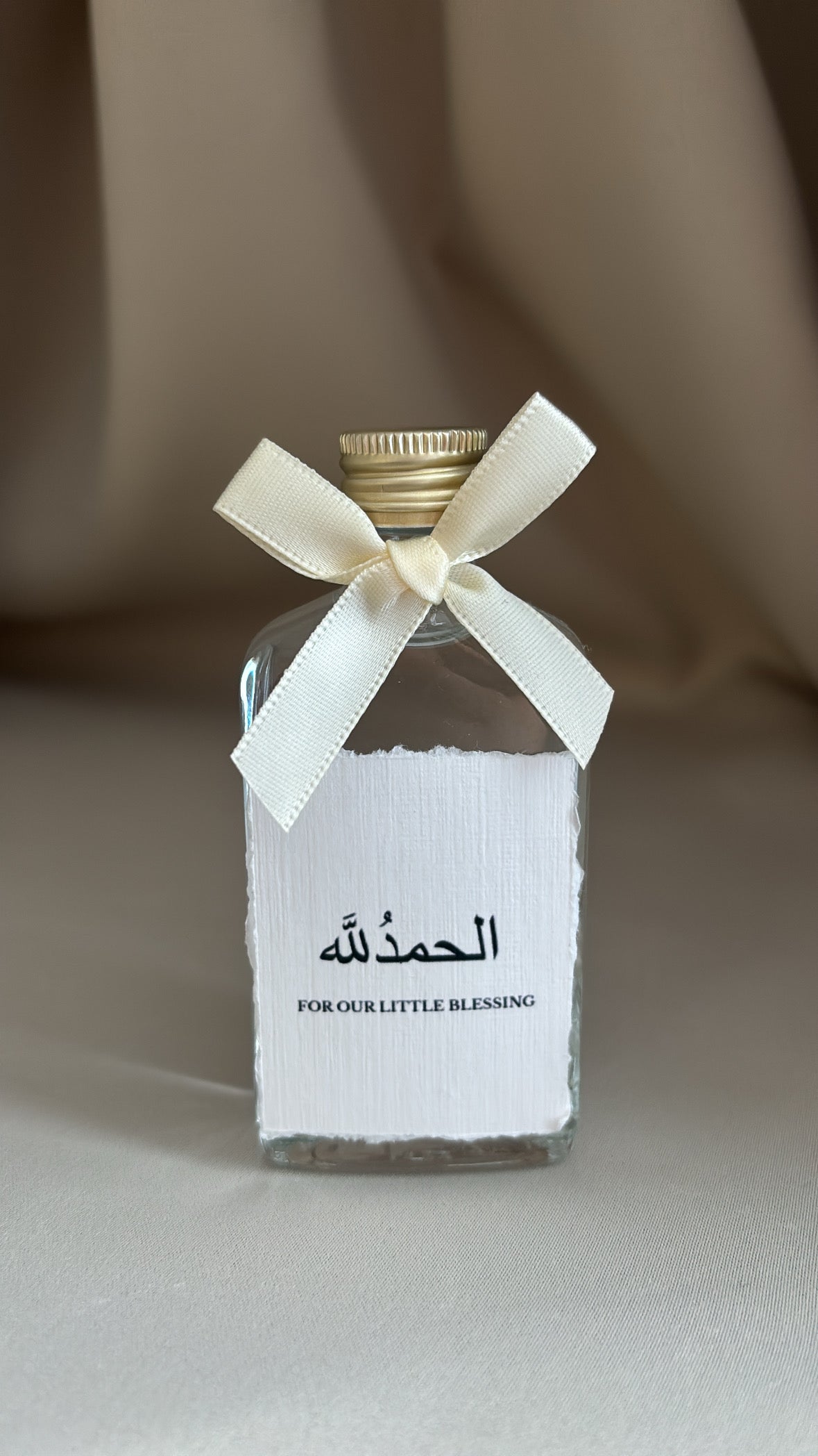 Zamzam flesje met gepersonaliseerd label & strik