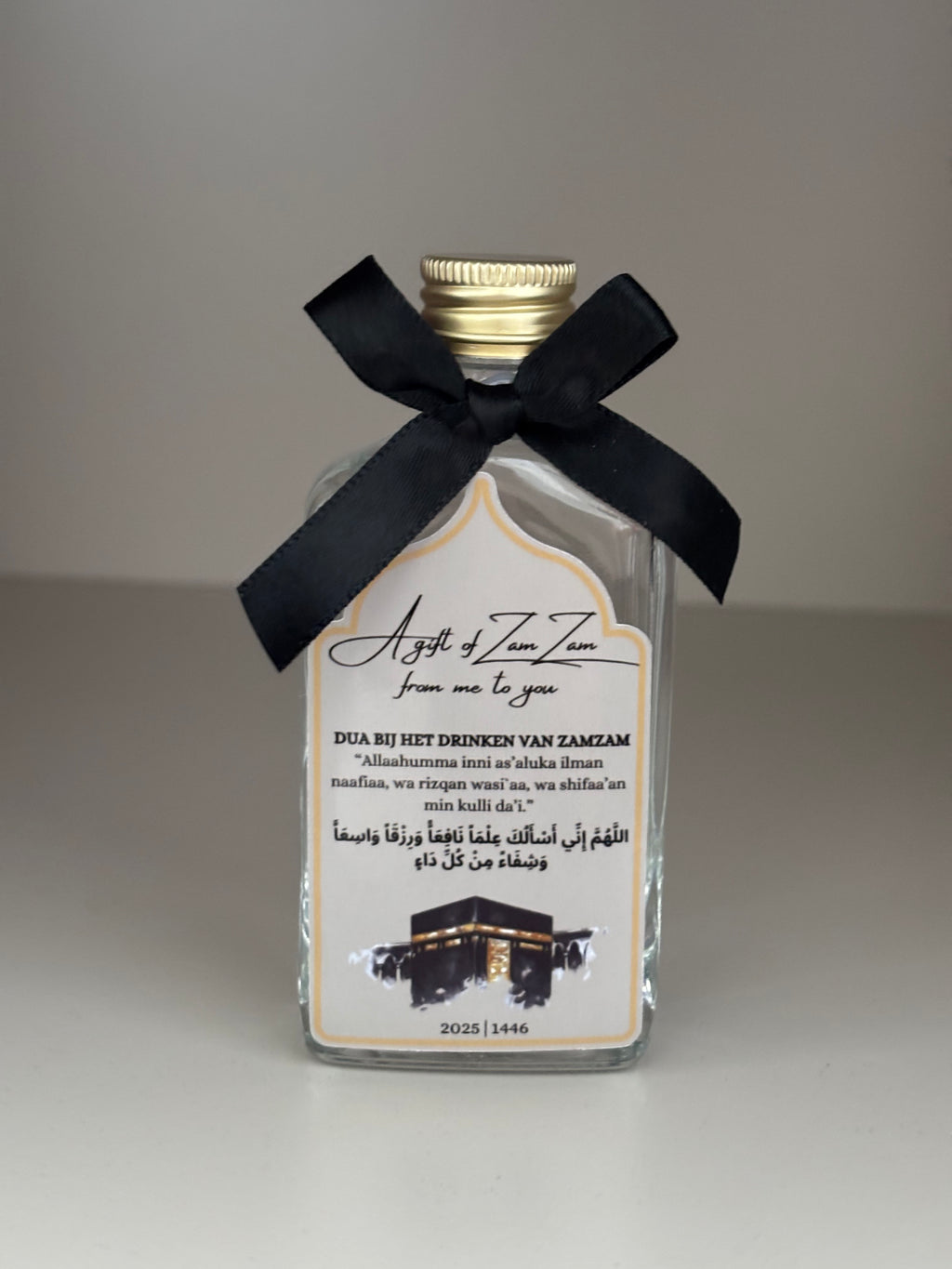 Gepersonaliseerd Umrah of hadj Mubarak flesje met Kaaba en lint.