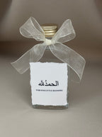 Zamzam flesje met gepersonaliseerd label & strik