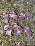Strikjes roze groot